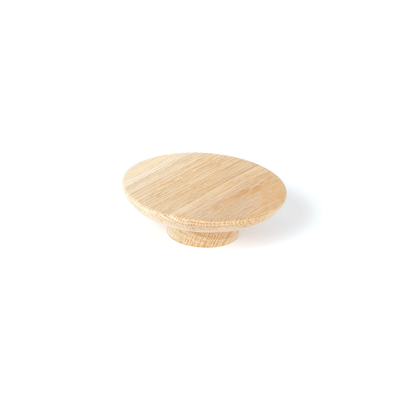 Momo Daintree Timber Full Round Cabinet Pull Handle in natural wood finish on a cabinet drawer