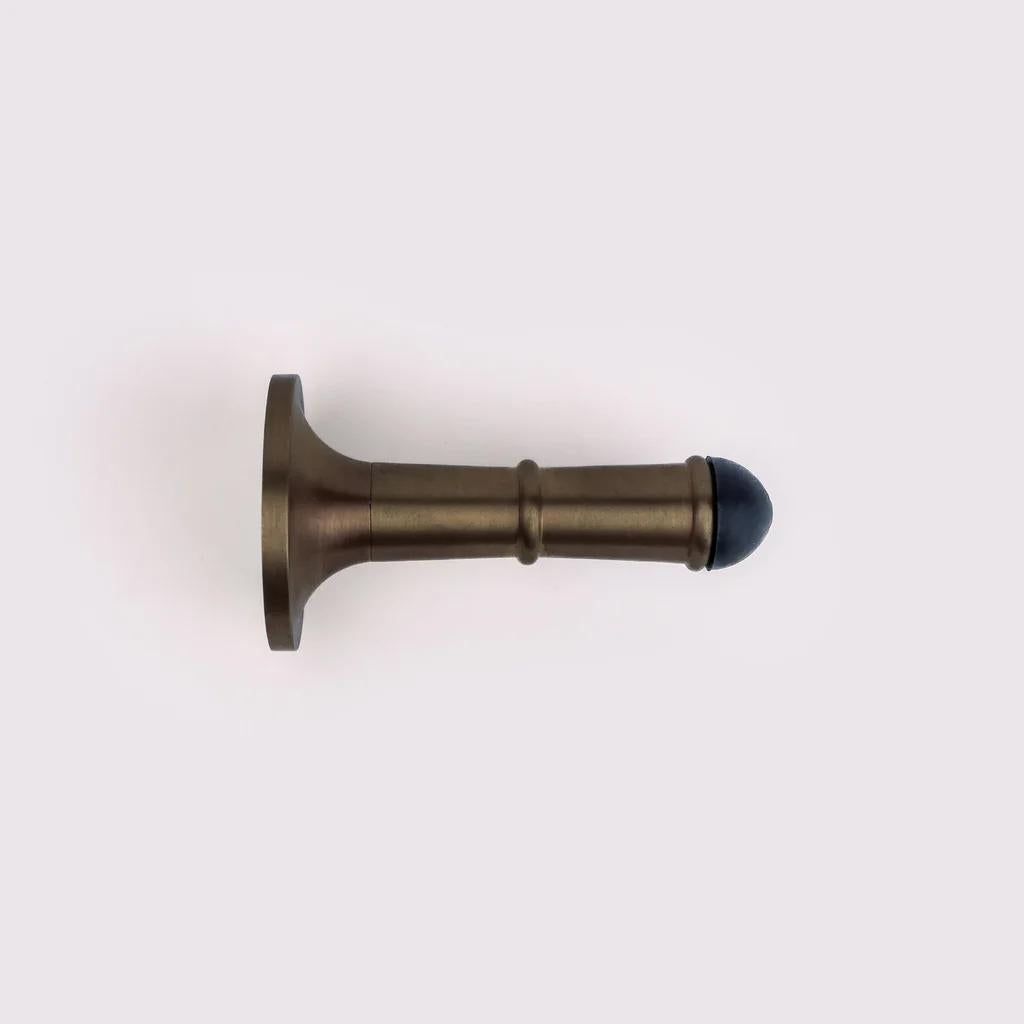 Wall Door Stop - Antique Bronze in Antique Bronze