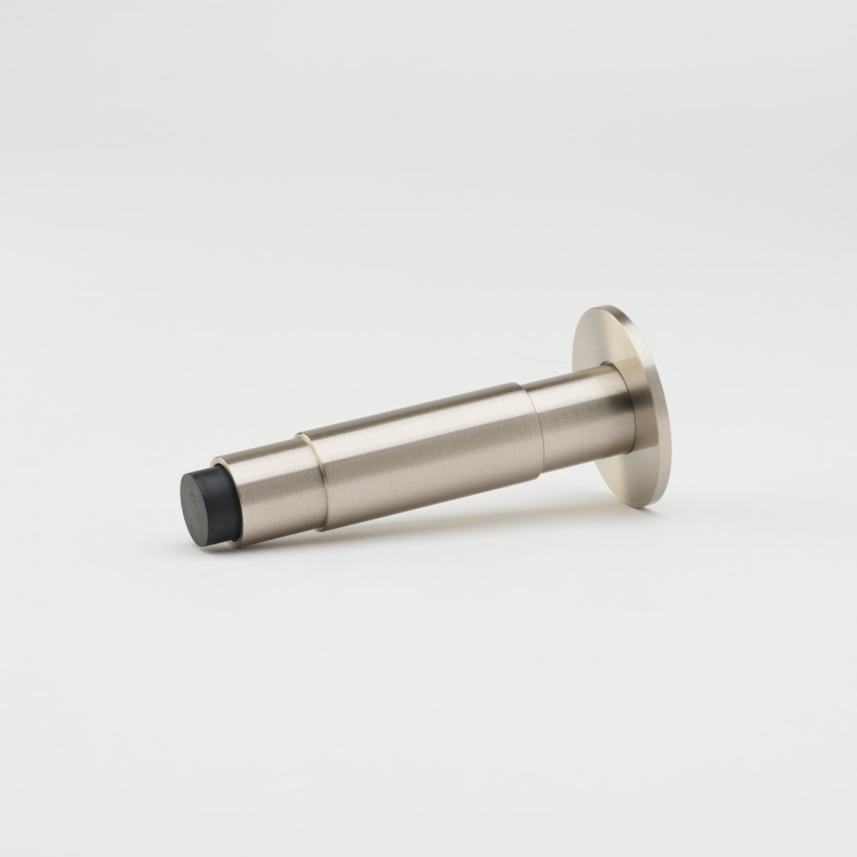 Lo & Co Lola doorstop from Lo & Co Interiors, a brass architectural hardware piece with a sleek, modern design.