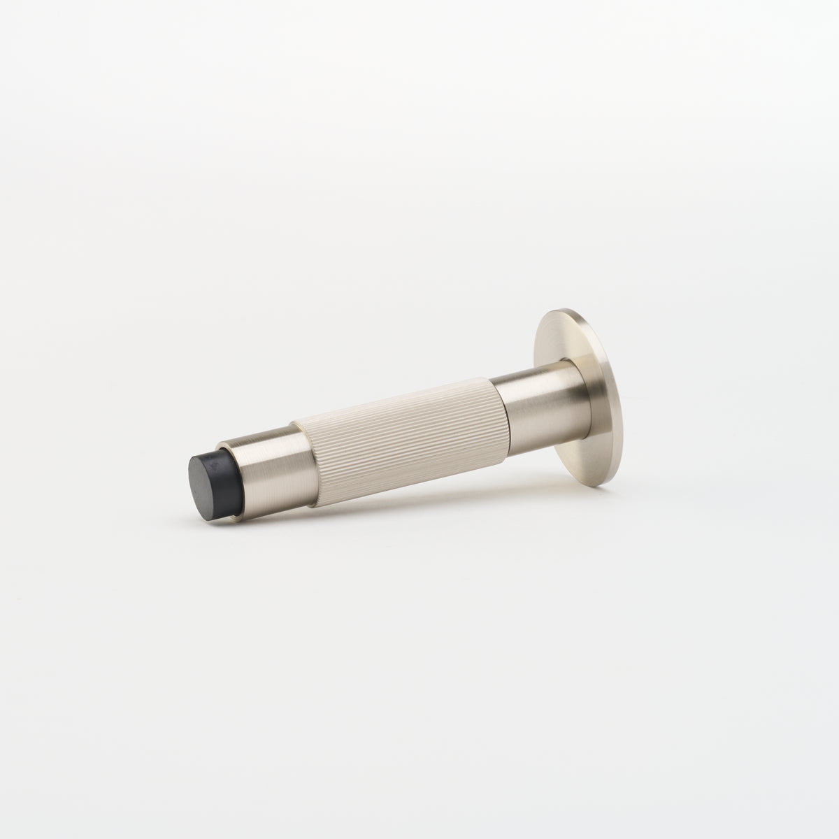 Lo & Co Linear Doorstop in brushed nickel, an architectural hardware piece with sleek modern design for door security.