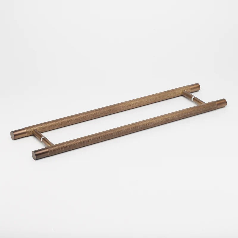 Lo & Co Kintore Entry Pull from Lo & Co Interiors, architectural hardware with a sleek design in brushed bronze finish.
