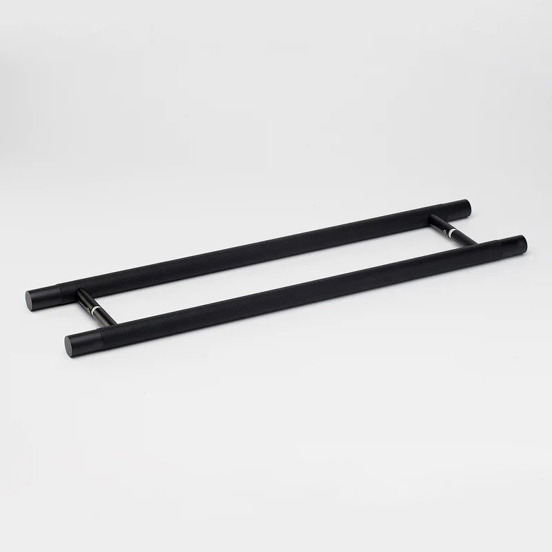 Lo & Co Kintore Entry Pull in matte black finish, showcasing its sleek architectural hardware design and modern handles.