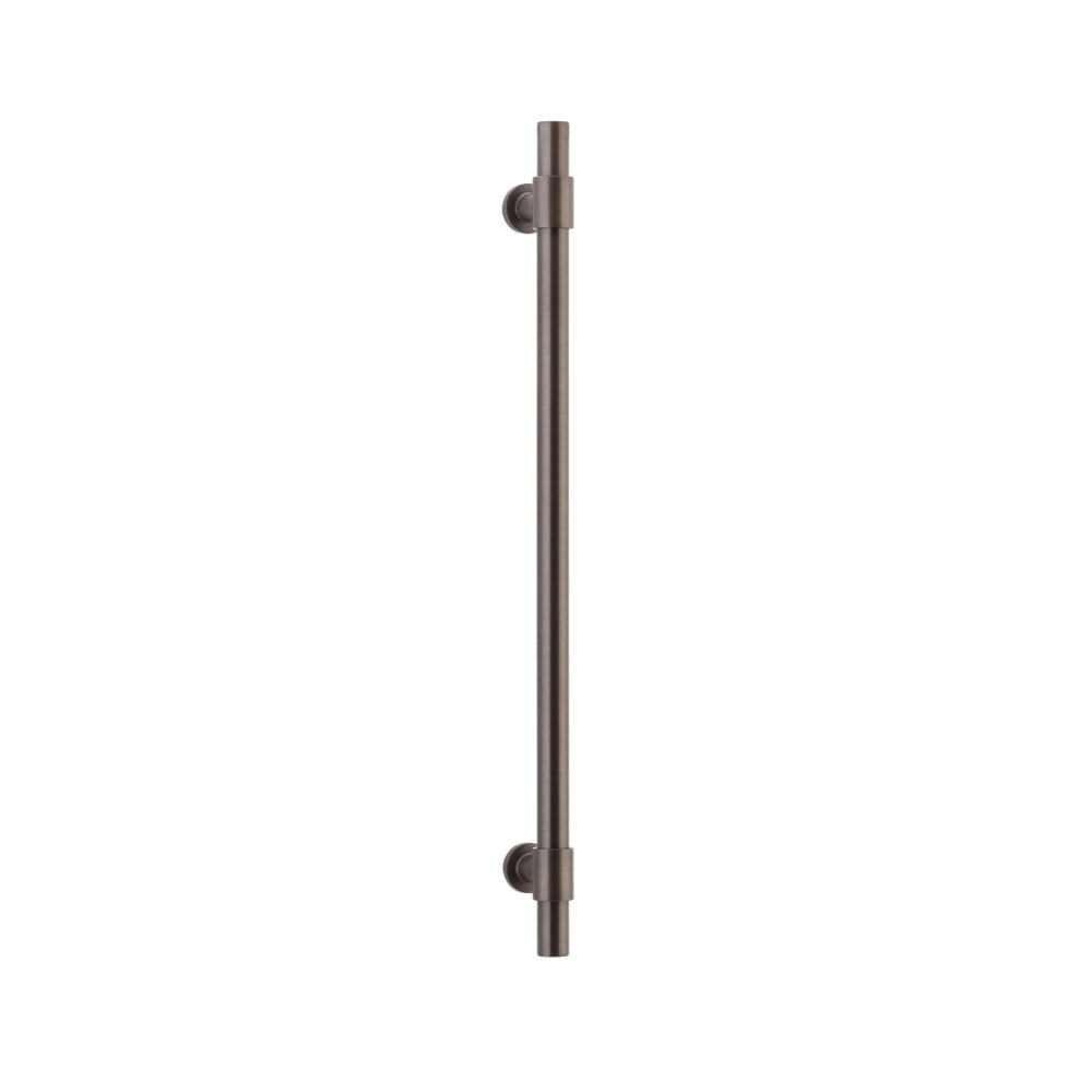 Iver Helsinki single pull handle, architectural hardware with sleek metal finish, mounted on a door or cabinet.