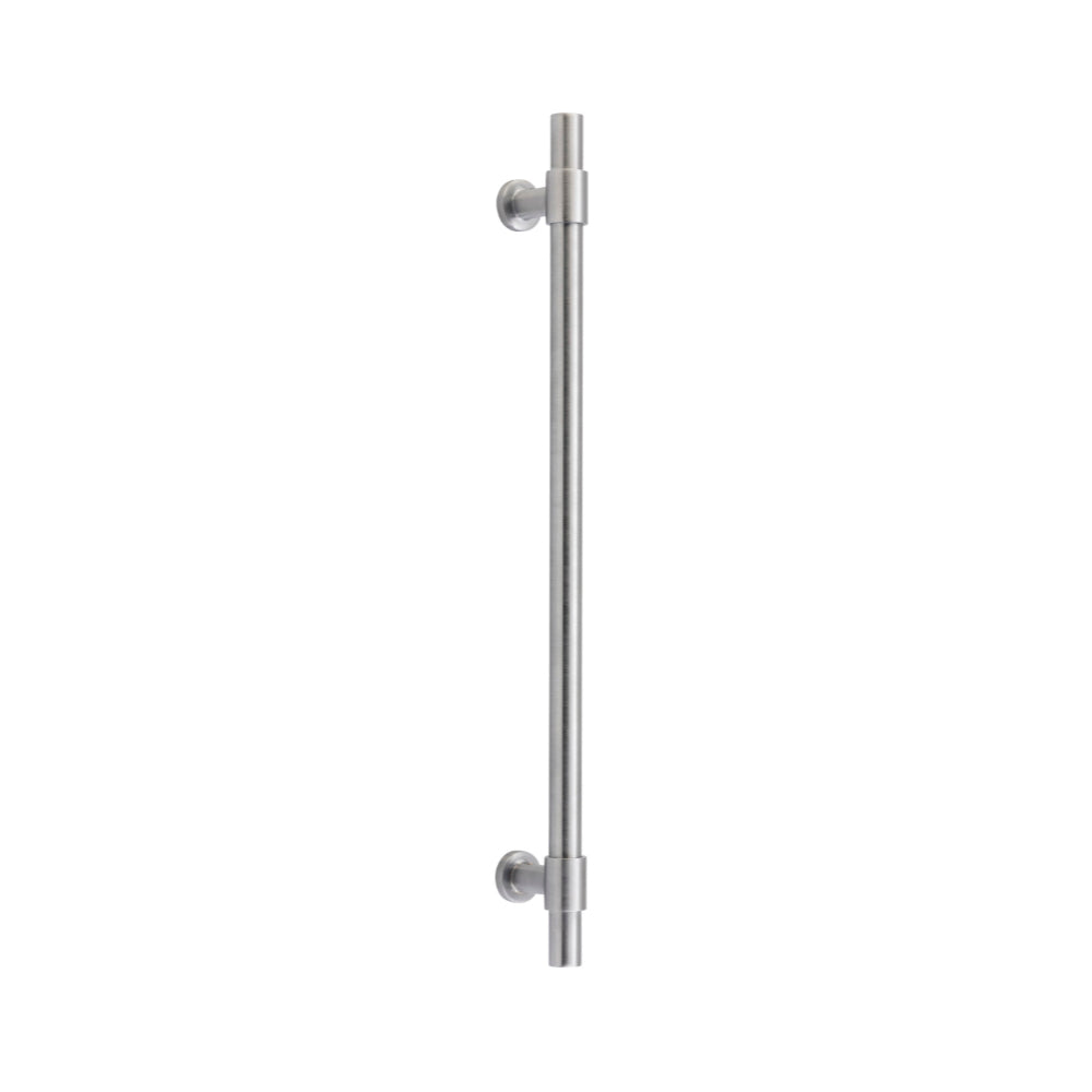Iver Helsinki single pull handle, architectural hardware with sleek metal finish, mounted on a door for modern design.