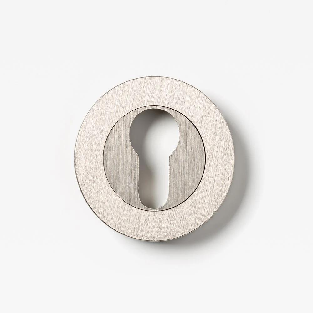 Brass Lo & Co Round Euro Cylinder Escutcheon for architectural hardware, showcasing a polished finish and clean circular design.
