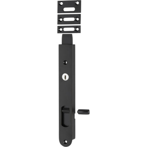 Iver Locking Flush Bolt installed on a wooden door, showcasing sleek architectural hardware for secure door fastening.