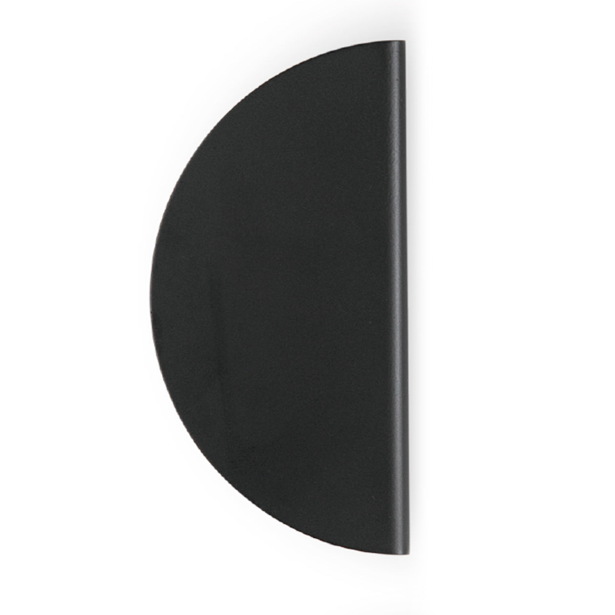 Momo SOLA half-round lip pull handle in matte black finish, mounted on a wooden drawer with visible mounting hardware
