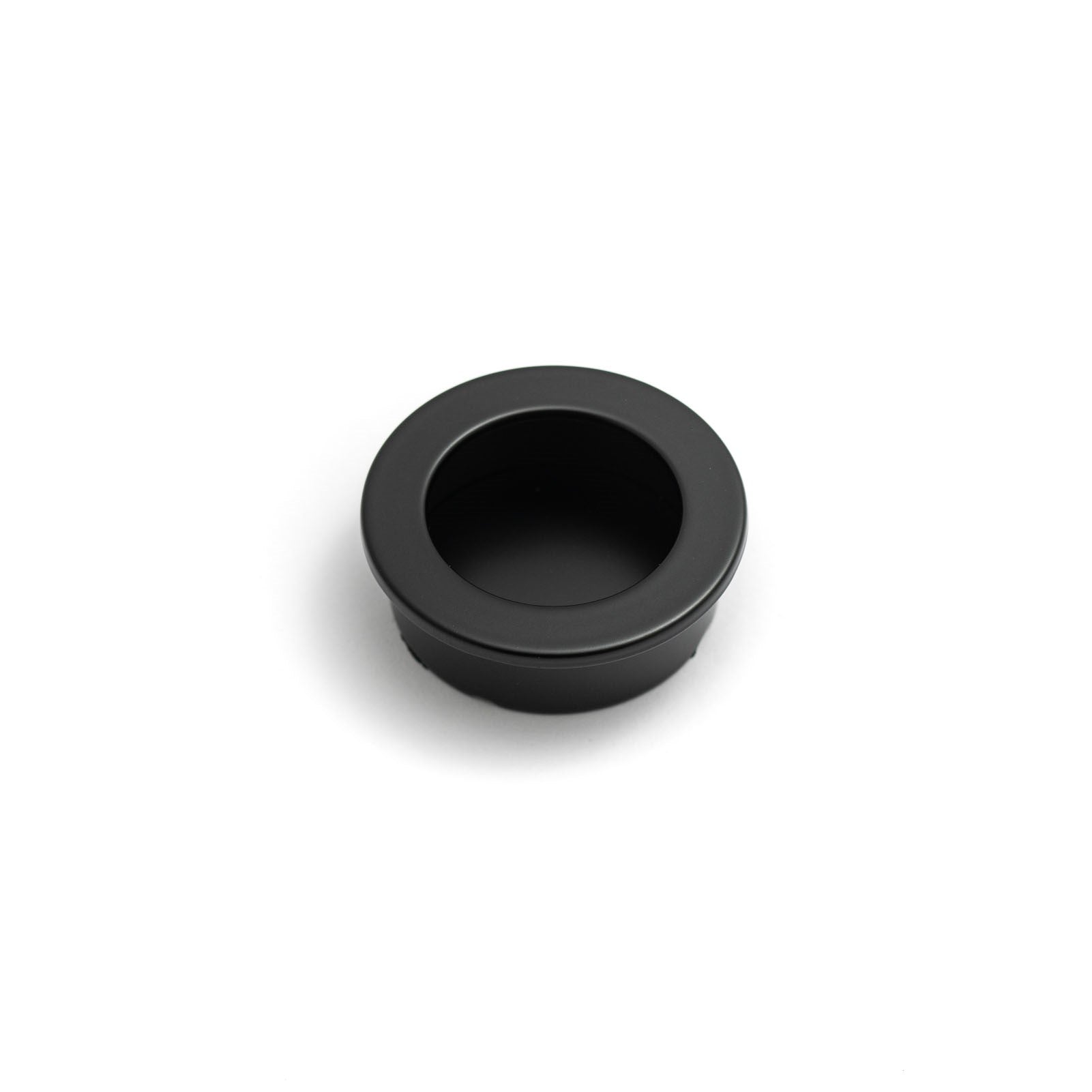 Castella round flush pull handle, 40mm diameter, with a sleek, polished finish, designed for cabinet or furniture doors.