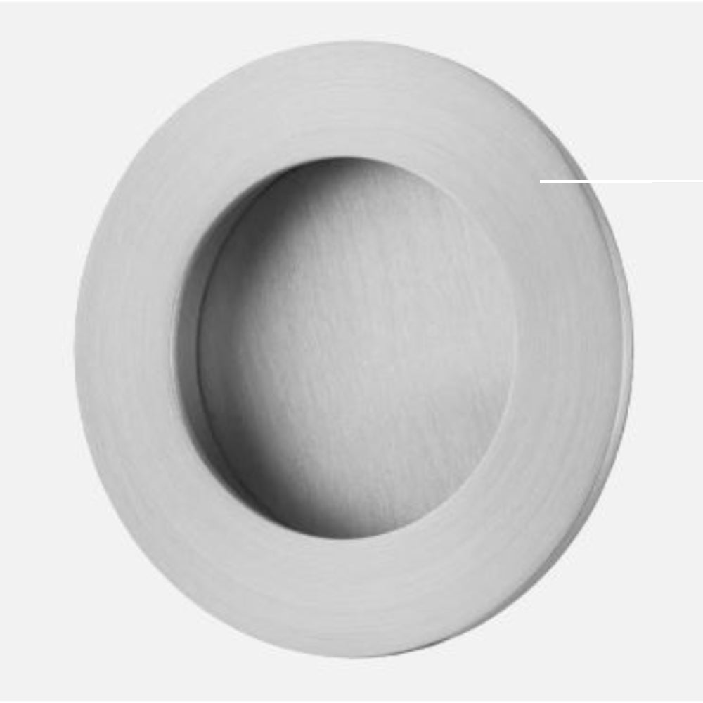Round designer flush pulls by Iver, showcasing sleek architectural hardware for modern cabinetry or furniture.