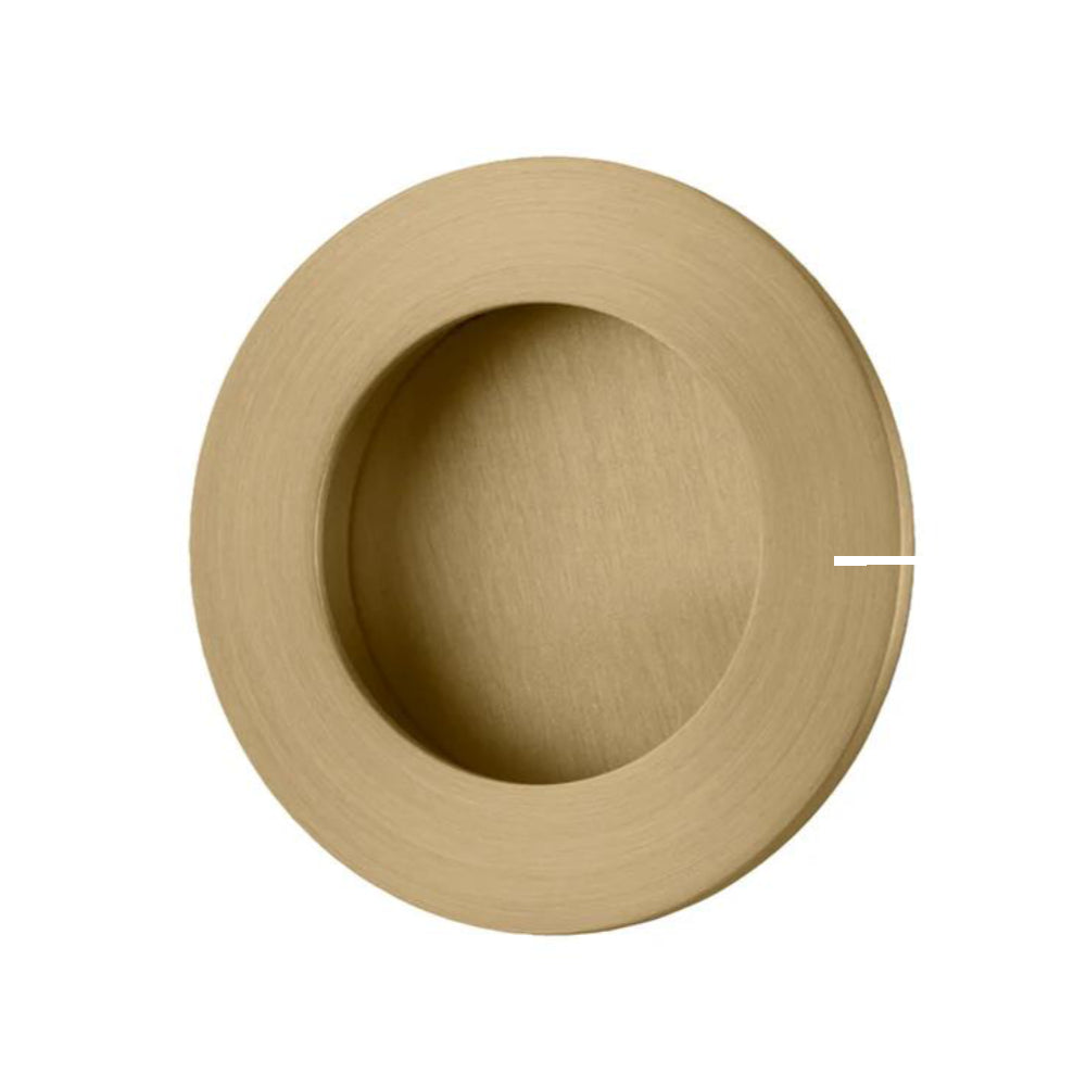 Round designer flush pull handle from Iver's architectural hardware collection, showcasing sleek circular metal design.