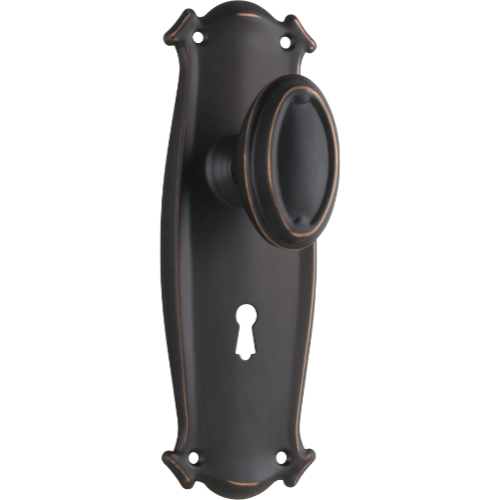 Pair of Tradco Bungalow knobs on long backplates, featuring vintage-style metal handles for cabinets or furniture.