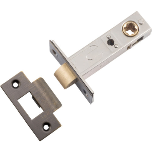Iver Hard Sprung Split Cam Tube Latch installed on a door, showcasing durable architectural hardware for secure locking.