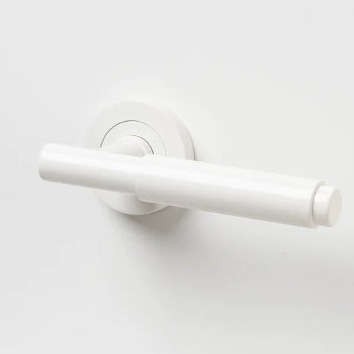 Lo & Co Lola Lever door handle in polished brass, featuring a sleek, modern design and ergonomic shape for easy grip.