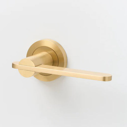 Lo & Co Intersect Lever door handle in brushed nickel finish, mounted on a modern door with visible hardware and clean design.