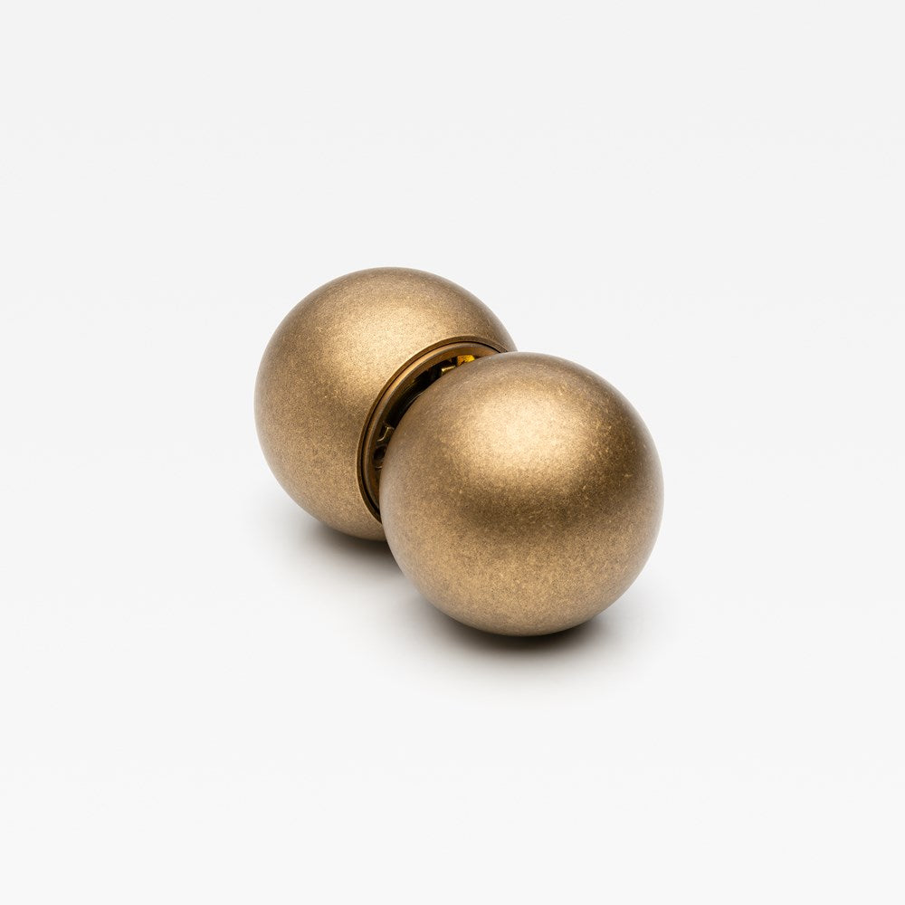 Lo & Co Interiors Sphere Passage Set featuring modern spherical decor pieces in a sleek design.