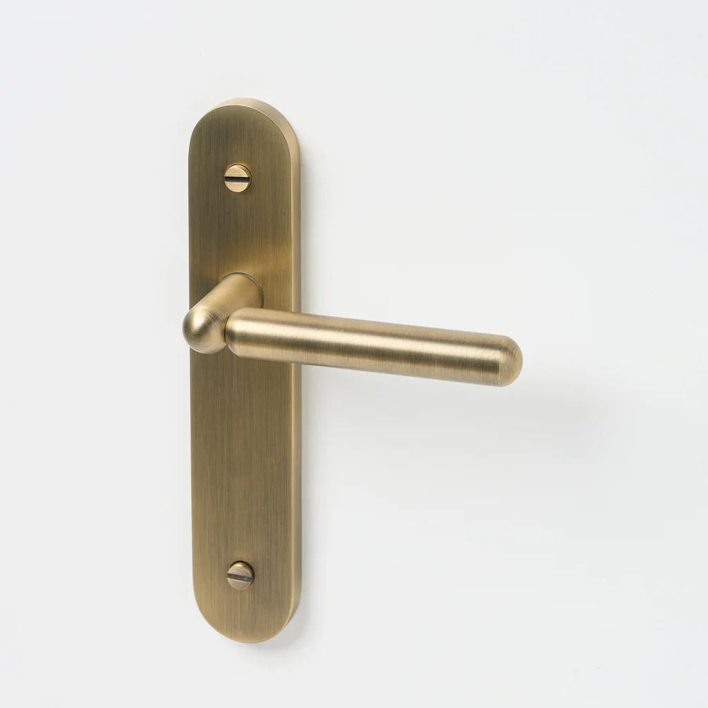 Tubby Lever Aged Brass in Aged Brass