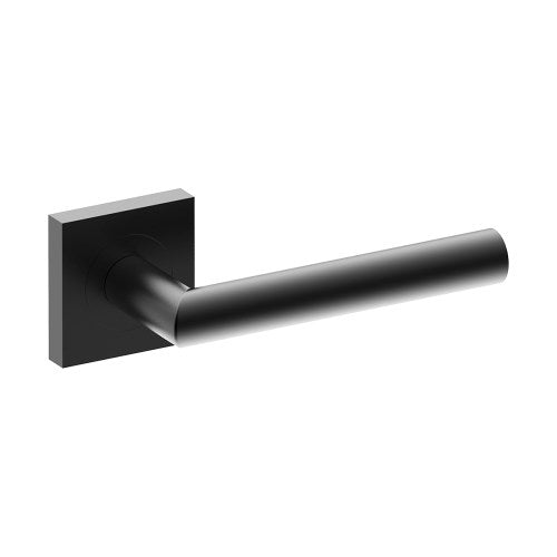 Black CETINA door handle by Style Finish Doorware mounted on a door with a sleek, modern design.