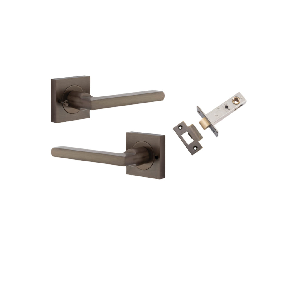 Pair of Iver Baltimore lever handles on square rose, featuring classic design and polished finish for interior door decor.