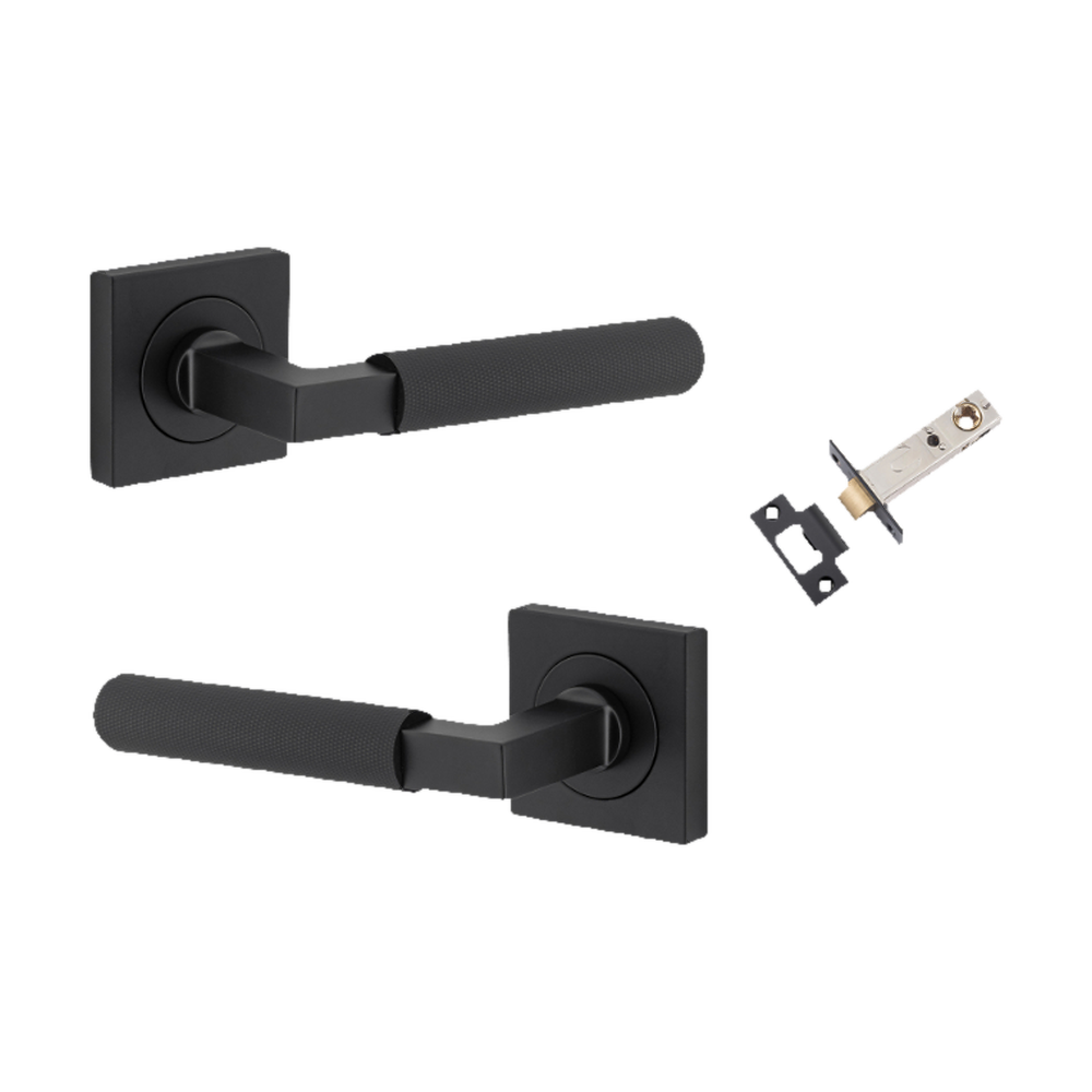 Pair of Iver Brunswick lever door handles on square rose, architectural hardware with a sleek, modern design.