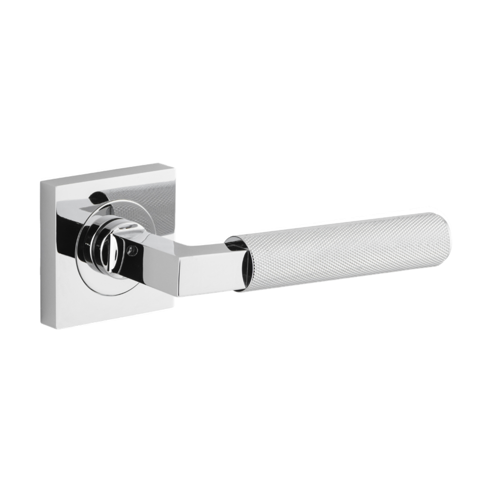 Pair of Iver Brunswick lever handles on square rose, architectural hardware with a sleek, modern finish.