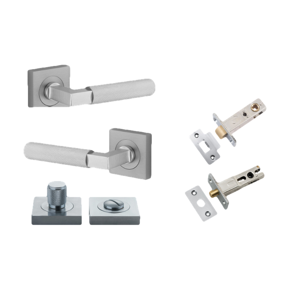 Pair of Iver Brunswick lever door handles on square rose in architectural hardware style, shown in a natural finish.