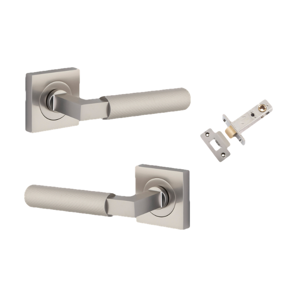 Pair of Iver Brunswick lever handles on square rose for architectural hardware, featuring a sleek, modern design in a polished finish.