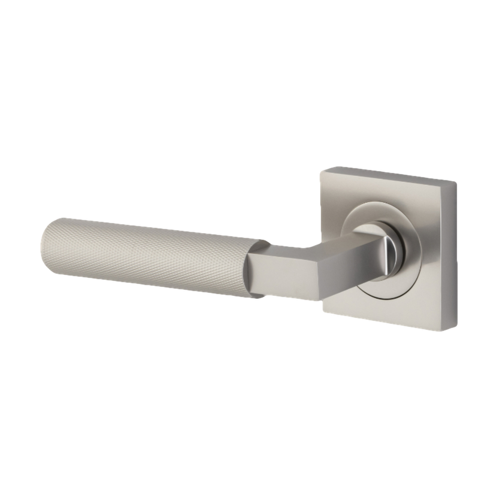Pair of Iver architectural hardware brass lever handles on square rose, suitable for doors, with a sleek modern design.
