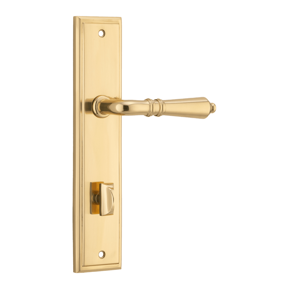 Pair of Iver Sarlat lever handles on stepped backplate, showcasing elegant metal door hardware with a polished finish.