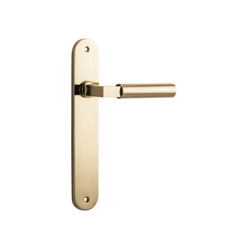 Pair of Iver Berlin lever door handles with oval backplates, featuring a sleek, modern design, shown on a light background.