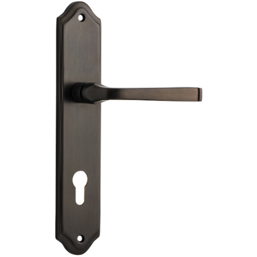 Pair of Iver Annecy lever handles with shouldered backplates, featuring a sleek, modern design for interior doors.