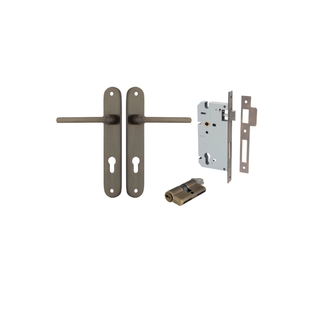 Pair of Iver Baltimore lever door handles on oval backplates, featuring sleek black finish and modern design.