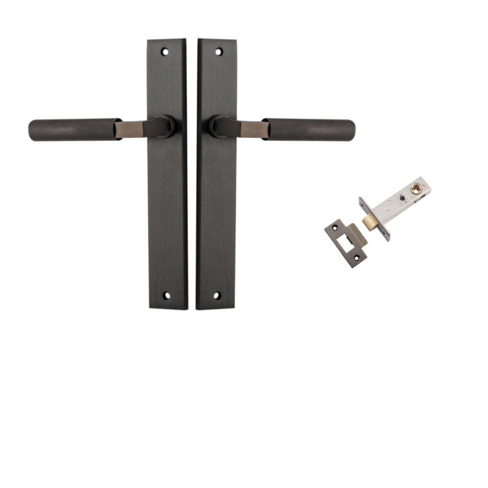 Pair of Iver Brunswick lever door handles on rectangular backplates, featuring a sleek, modern design in a polished finish.