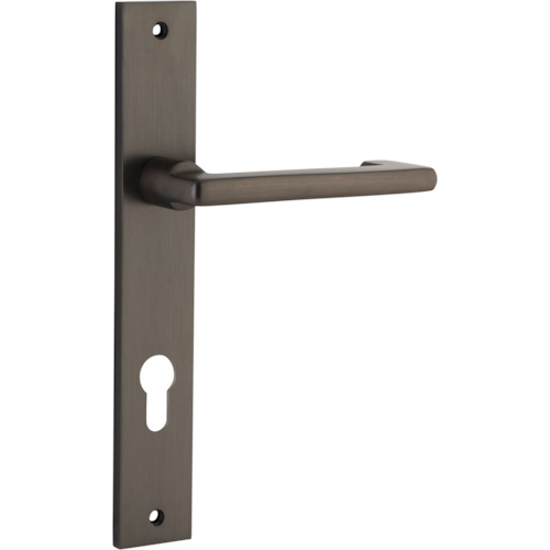 Pair of Iver Baltimore return lever handles on rectangular backplates, featuring a sleek, modern design for door hardware.