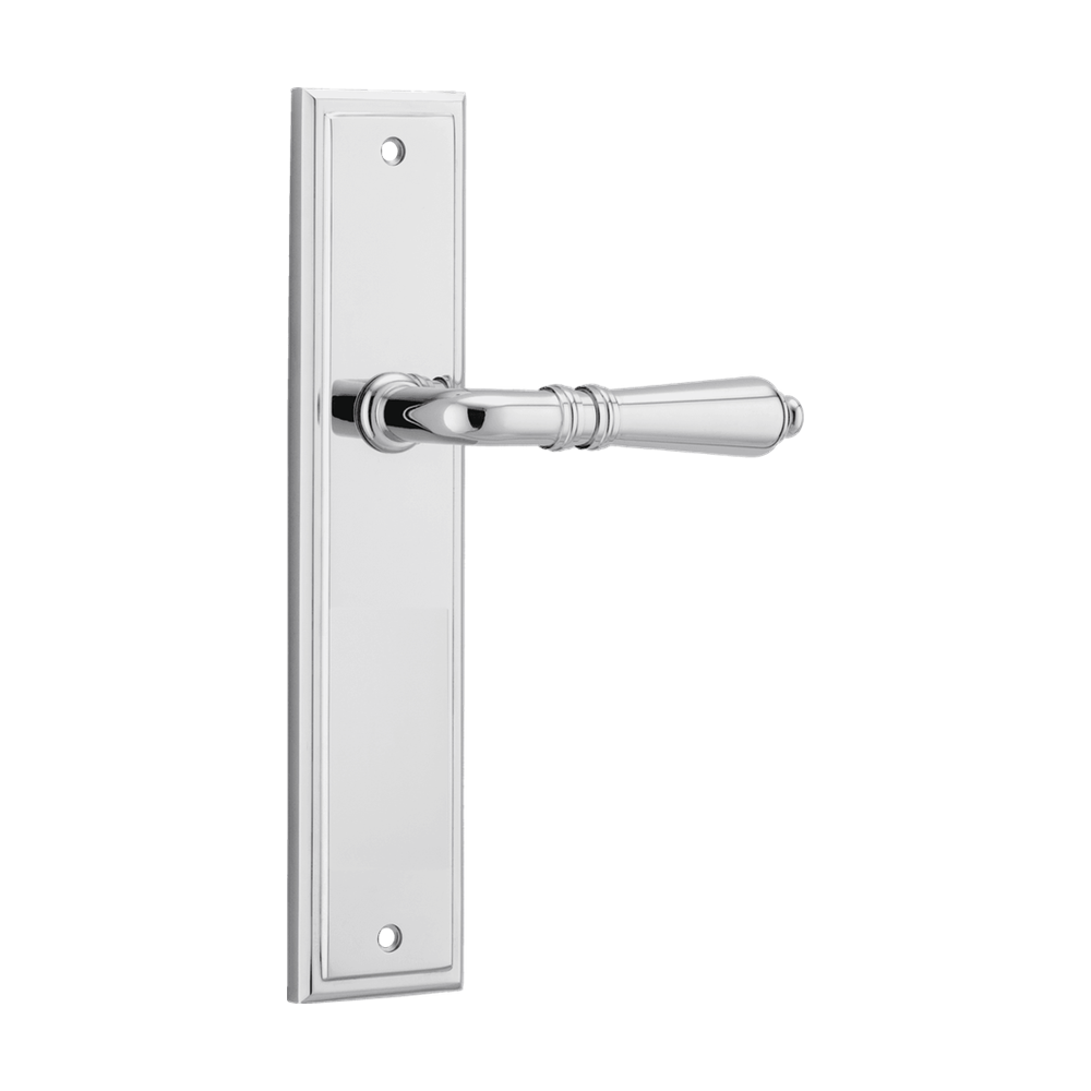 Pair of Iver Sarlat lever handles on stepped backplates, showcasing elegant brass finish and traditional design.