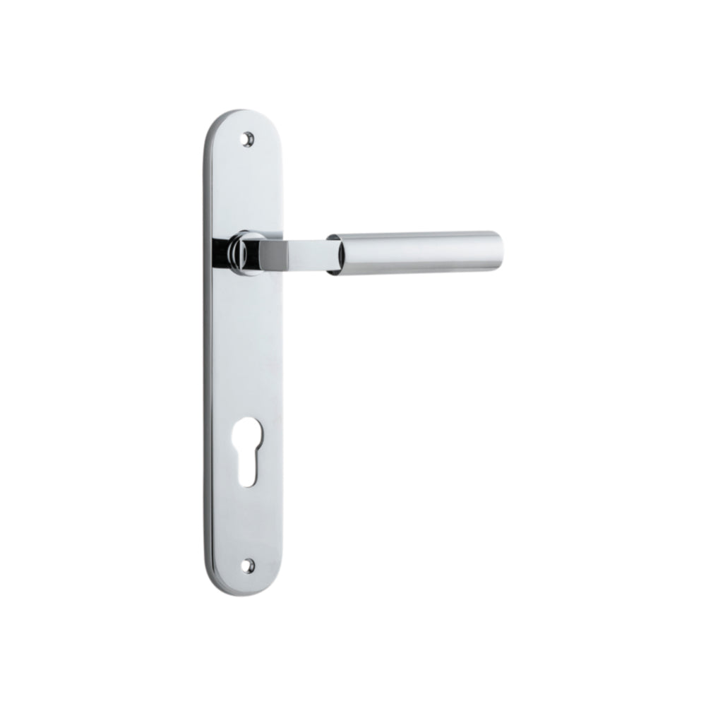 Pair of Iver Berlin lever door handles on oval backplates, featuring a sleek, modern design in a polished finish.