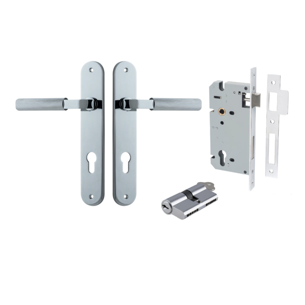 Pair of Iver Brunswick lever handles on oval backplates, architectural hardware for doors, in a polished finish.
