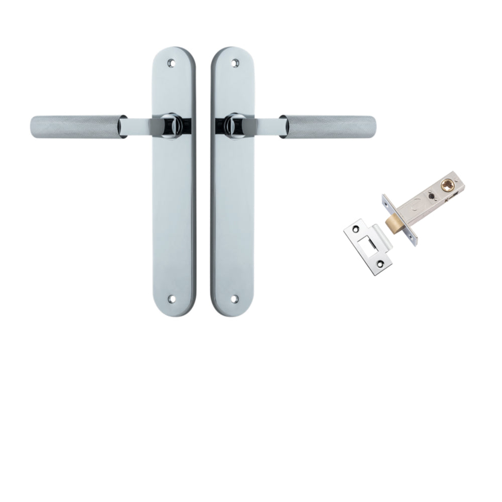 Pair of Iver Brunswick lever door handles on oval backplates, architectural hardware in a sleek, modern finish.