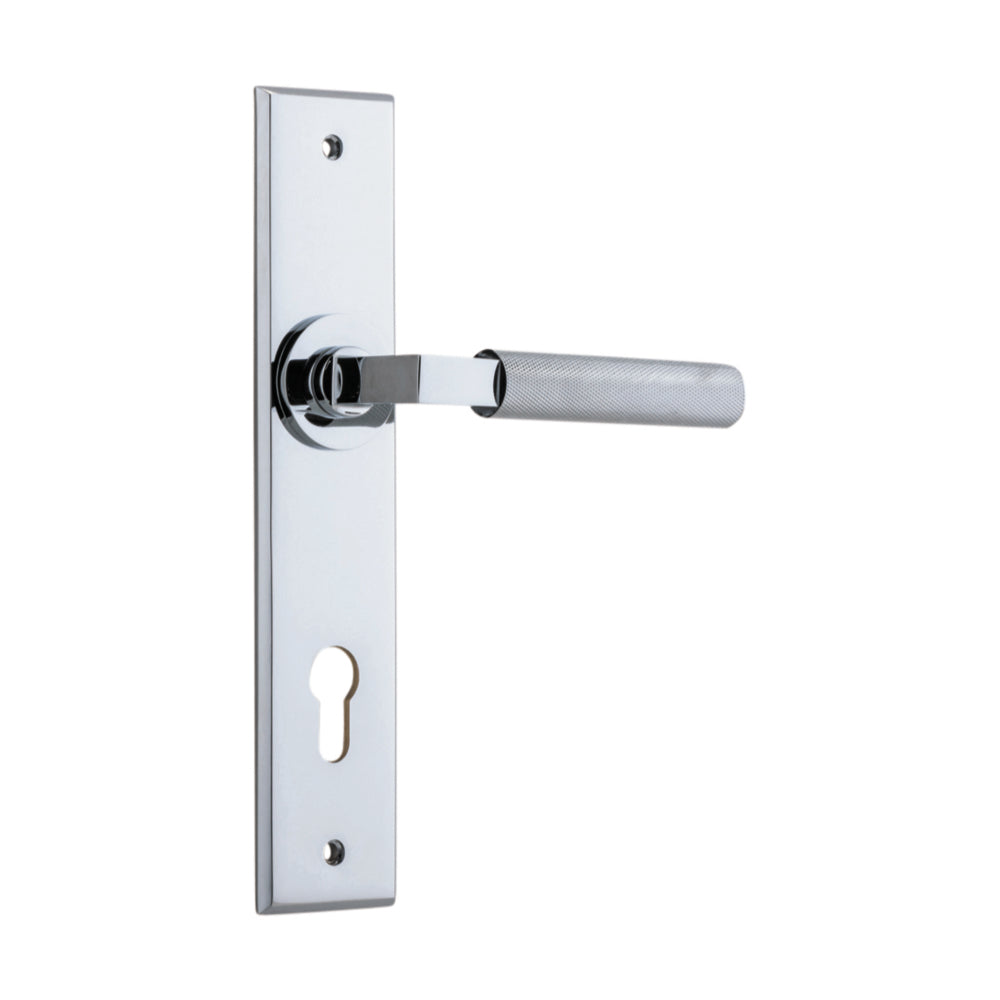 Pair of Iver Brunswick lever door handles on chamfered backplates, showcasing sleek architectural hardware design.