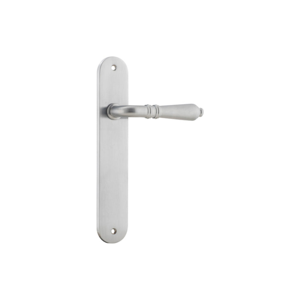 Pair of Iver Sarlat lever door handles on oval backplates, featuring a sleek, modern design for interior or exterior doors.