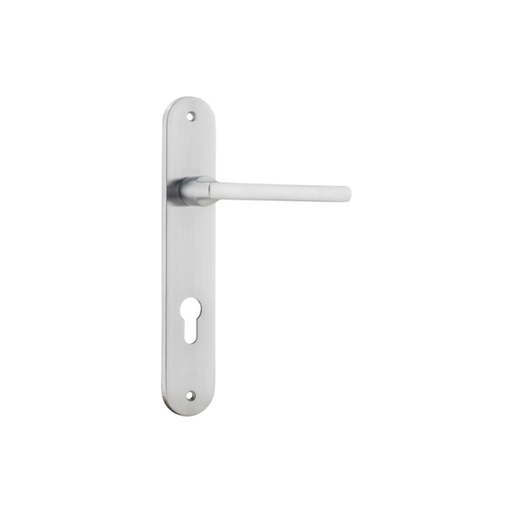 Pair of Iver Baltimore lever door handles on oval backplates, featuring a sleek, modern design for interior doors.