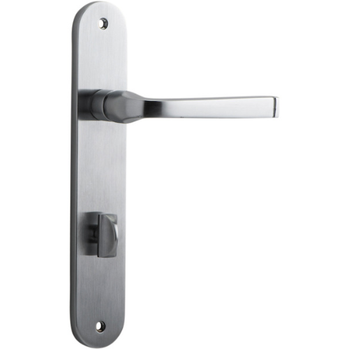 Pair of Iver Annecy lever door handles with oval backplates, featuring a sleek, modern design for stylish interior doors.
