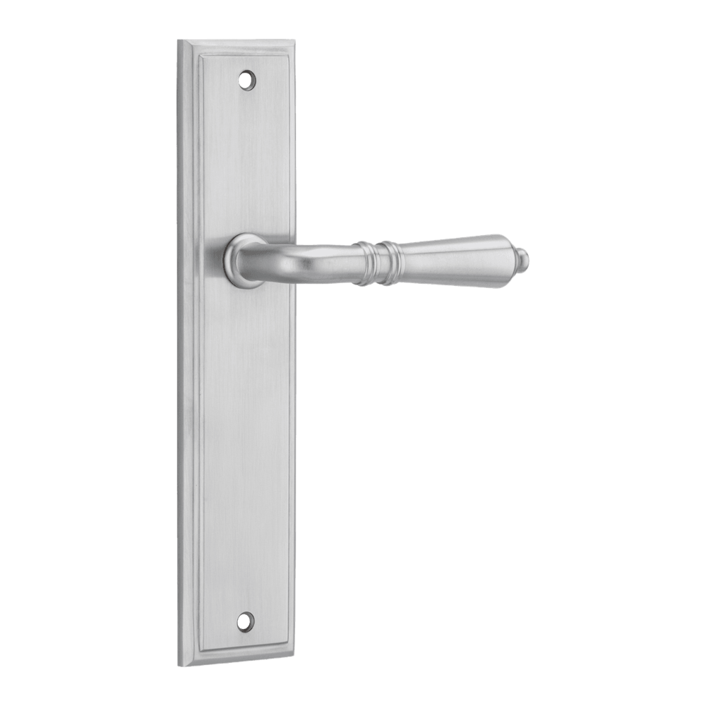 Pair of Iver Sarlat lever handles on stepped backplates, showcasing elegant door hardware with a polished finish.