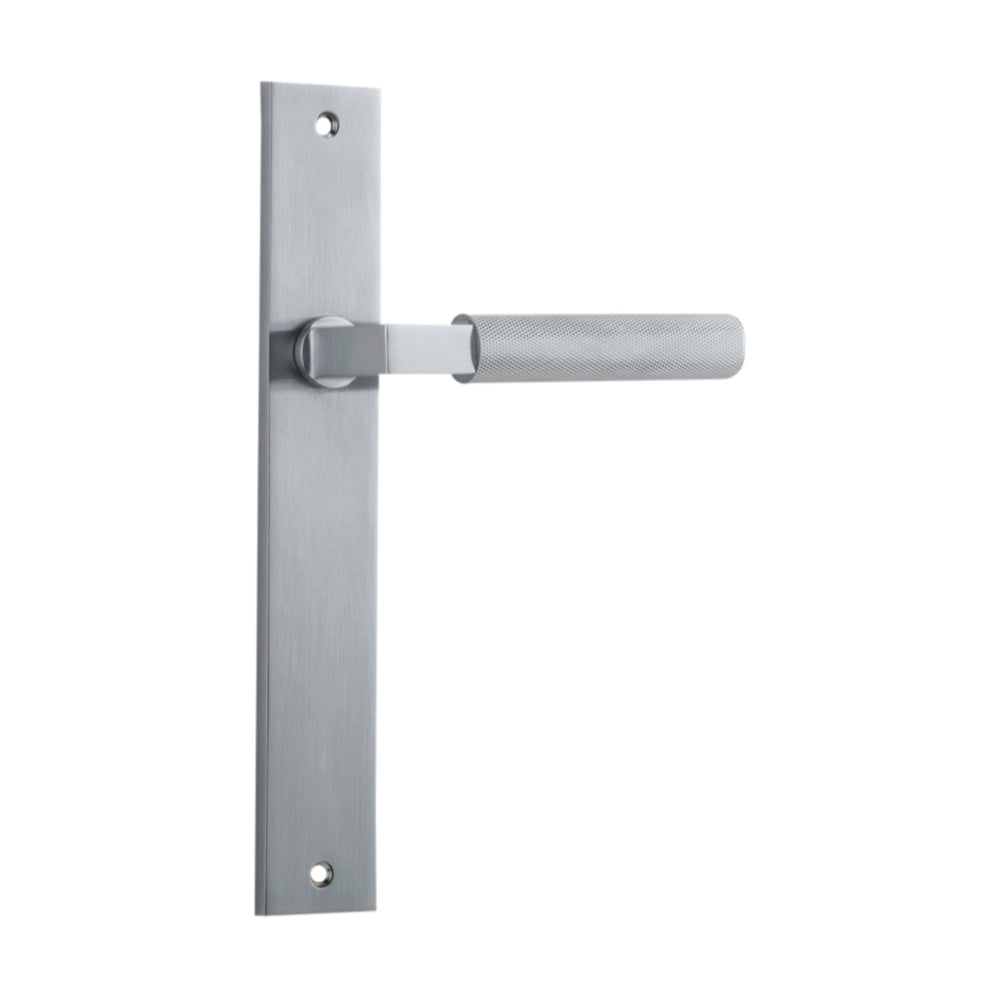 Pair of Iver Brunswick lever door handles on rectangular backplates, featuring a sleek, modern design in a polished finish.