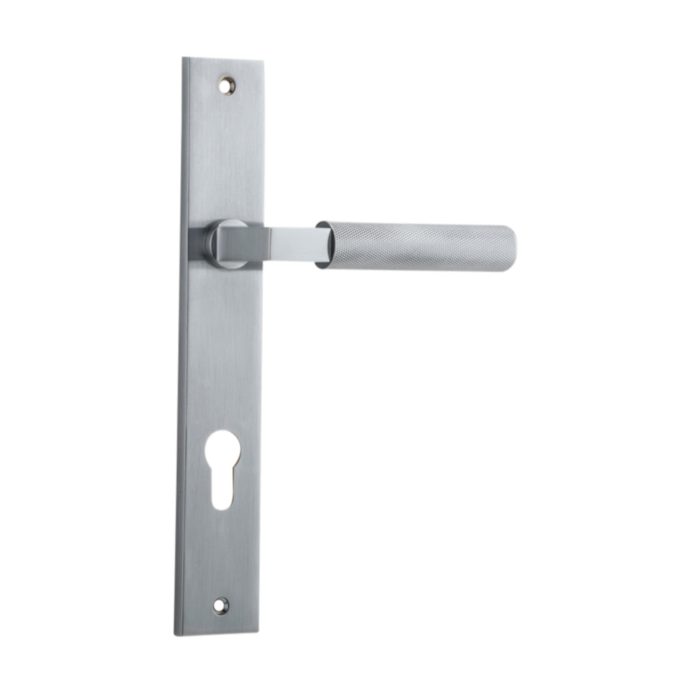 Pair of Iver Brunswick lever door handles on rectangular backplates, featuring a sleek, modern design for interior doors.