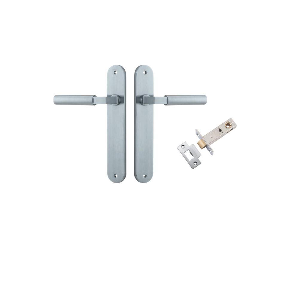Pair of Iver Berlin lever door handles on oval backplates, featuring a sleek design and polished finish.