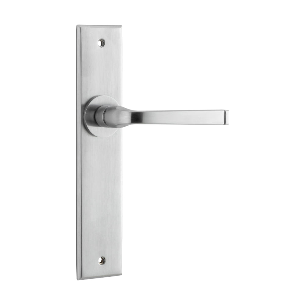 Pair of Iver Annecy lever door handles with chamfered backplates, showcasing sleek, modern design in a polished finish.
