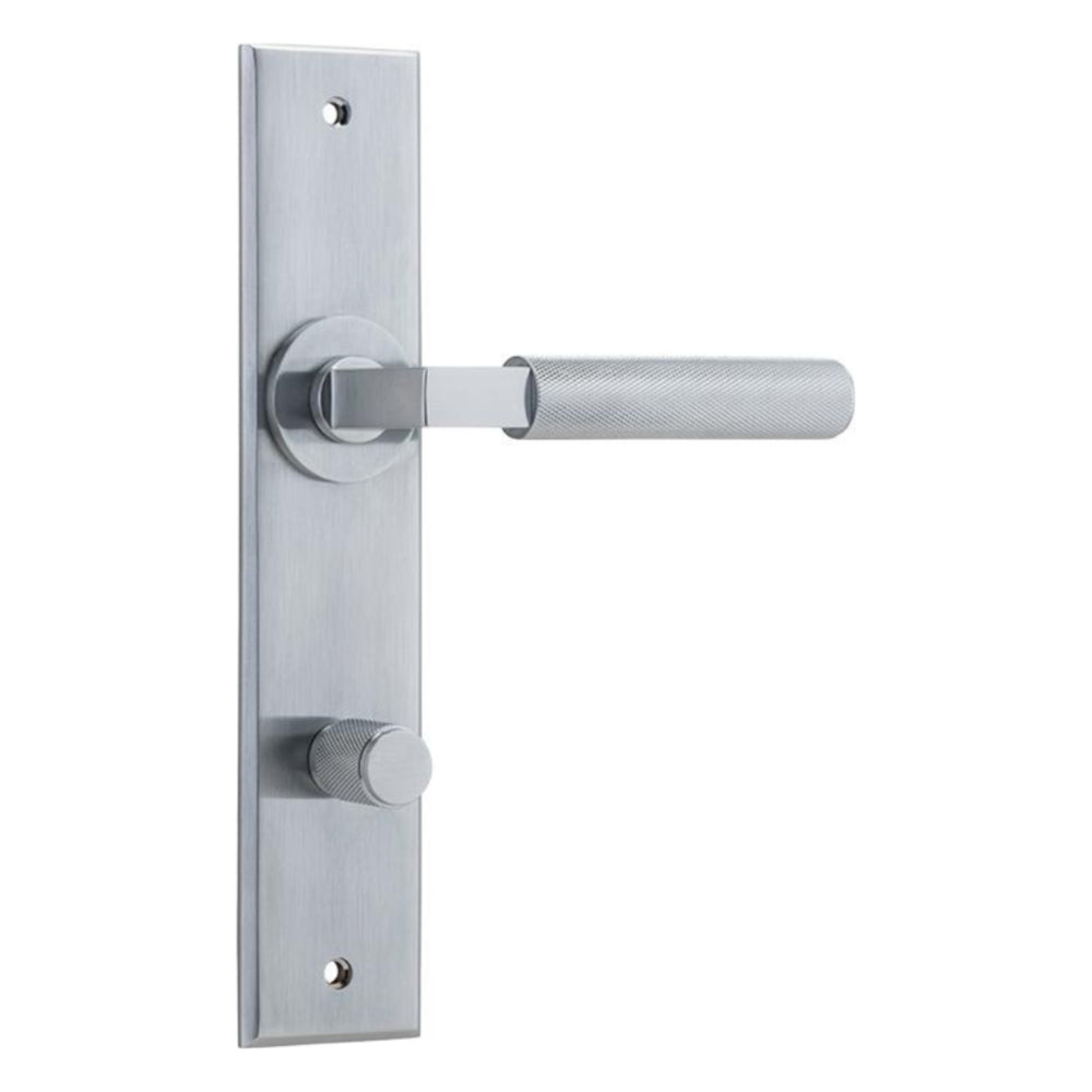 Pair of Iver Brunswick lever door handles on chamfered backplates, showcasing sleek architectural hardware design.