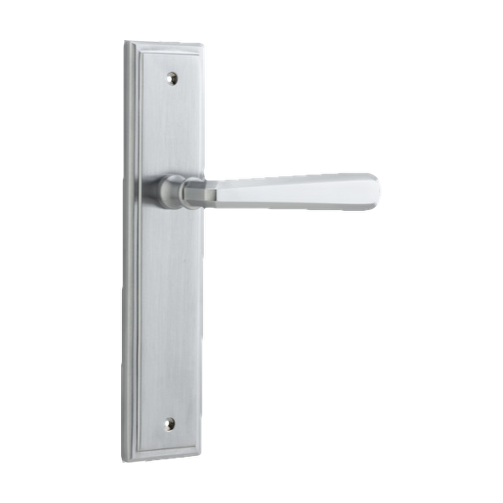 Pair of Iver Copenhagen lever door handles on stepped backplates, showcasing sleek architectural hardware design.