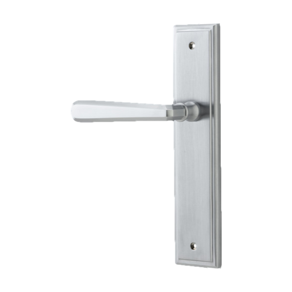 Pair of Iver Copenhagen architectural hardware levers with stepped backplate, showcasing sleek metal handles on a modern door.