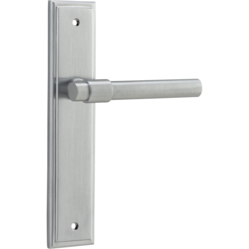 Pair of Iver Helsinki lever door handles on stepped backplates, featuring sleek modern design in a polished finish.